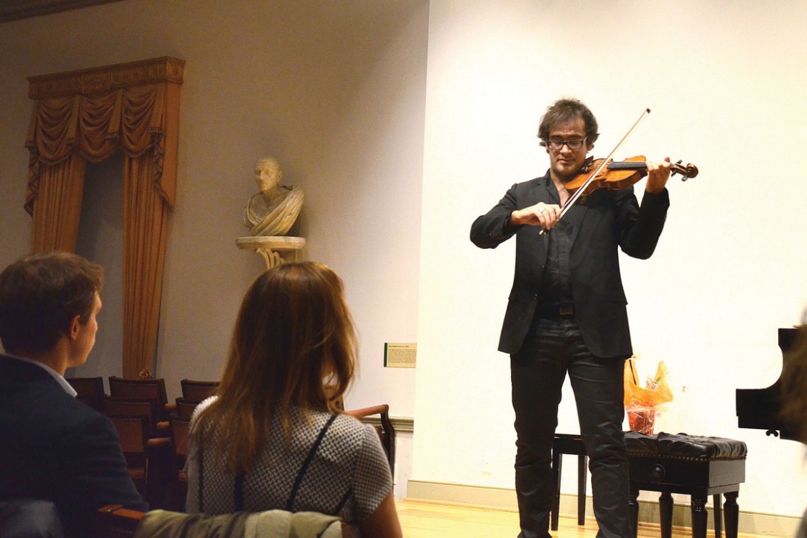 Violinist Marc Bouchkov rewards his concert audience with an encore at the Lyceum in Old Town Alexandria, Va.