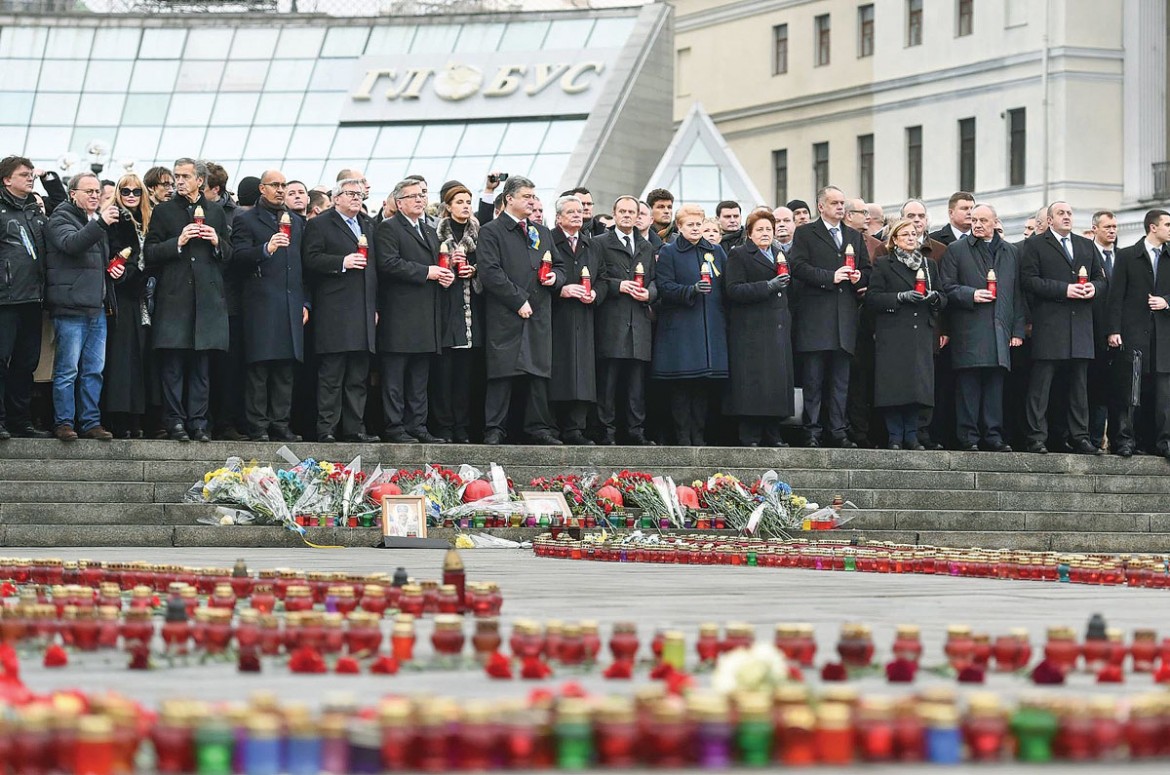 Foreign leaders join with Ukraine’s president on February 22 in the city center of Kyiv to remember the fallen on the first anniversary of the Revolution of Dignity.