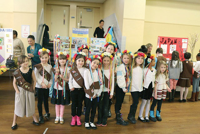 Brownie Troop 4883 makes a presentation about Ukraine at Girl Scout World Thinking Day in Washington.