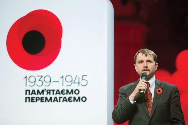 Volodymyr Vyatrovych speaks during a ceremony at the Mystetskyi Arsenal in Kyiv, where the “Remembrance Poppy,” Ukraine’s new symbol of victory over Nazi Germany in World War II, was unveiled.