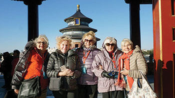 Ladies posing in front of the “Temple of Heaven,” considered the most holy of all imperial temples in Beijing, dating back to 1420.