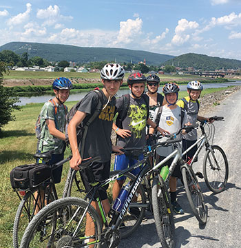 At Great Allegheny Passage Trail, campers from Pysanyi Kamin in Middlefield, Ohio, during their 105-mile biking trip from Cumberland, Md., to Ohiopyle, Pa. 