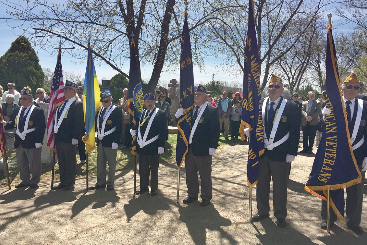 Ukrainian American Veterans serve as a color guard during the commemorative service at the Memorial Cross in St. Andrew Cemetery.