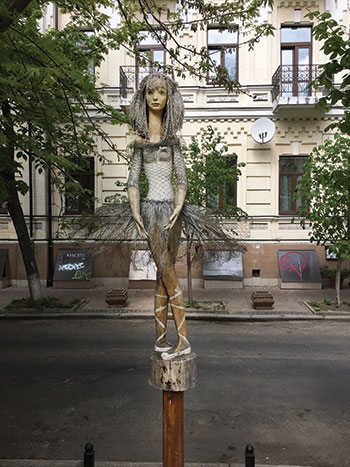 Downtown Kyiv is flush with street art, like this wooden sculpture of a ballerina dressed in chicken wire about 50 meters from the Golden Gate.