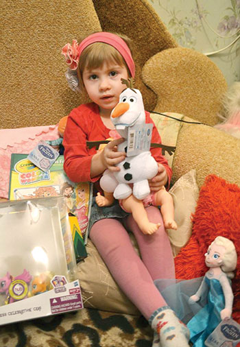One of the children in Ukraine who received gifts from Plast families in New Jersey.