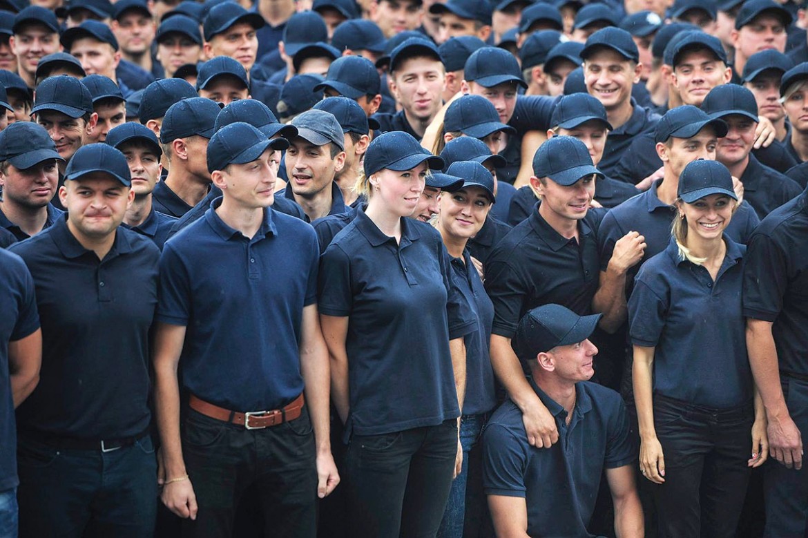 Some of the first graduates of a new training program for Kyiv patrol police.