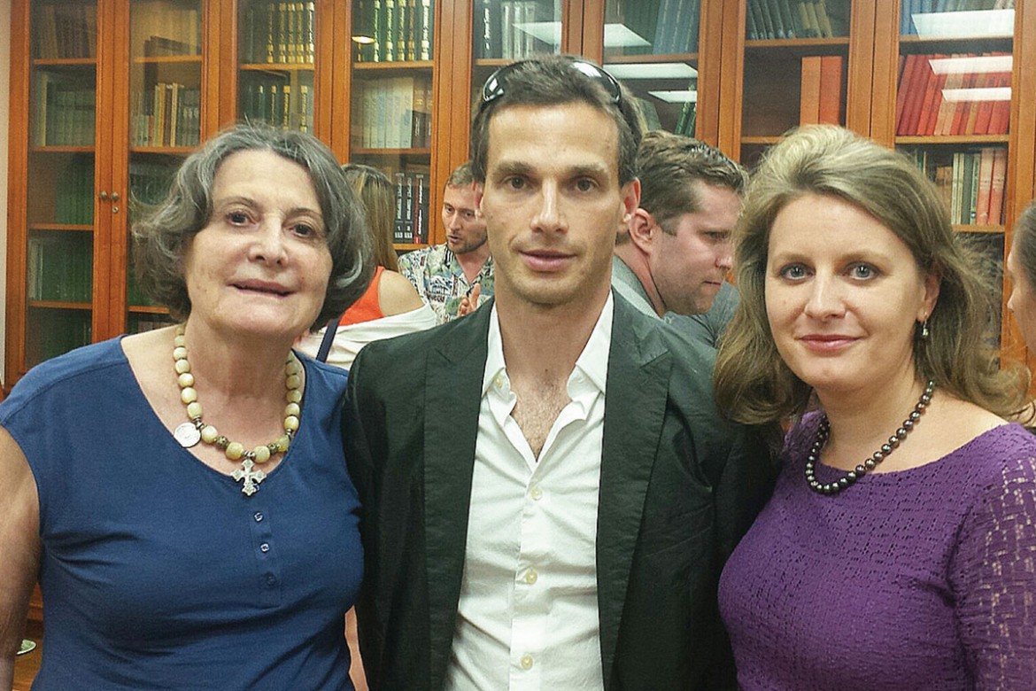 Prof. Anna Procyk (left) and Karina Tarnawsky (right), board members of the Shevchenko Scientific Society, with Roman Torgovitsky during the reception that followed the forum on the humanitarian crisis in Ukraine.
