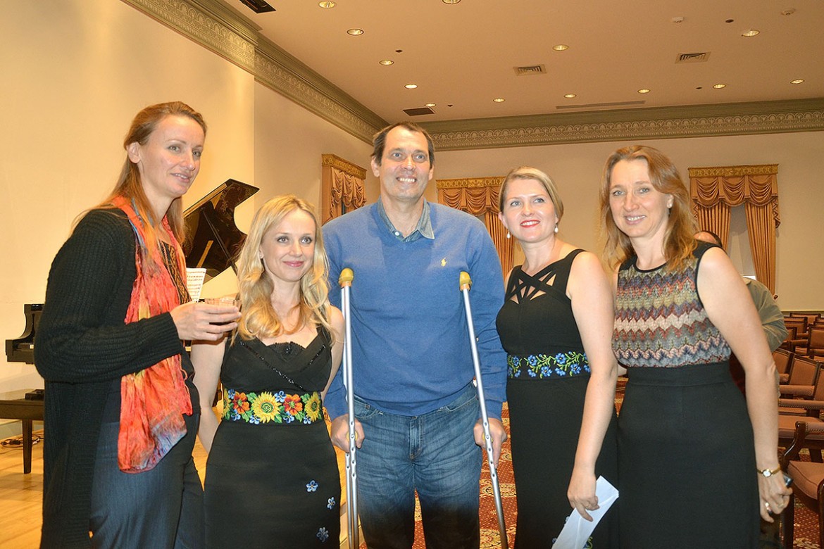 Sasha Kosolapov, an injured Ukrainian soldier now undergoing medical treatment at Walter Reed military hospital, poses for a group photo with the musicians and organizers of the TWG Cultural Fund concert at the Lyceum in Alexandria, Va.: (from left) Oleksandra Pavlyuk of United Help Ukraine, violinist Solomiya Ivakhiv, pianist Angelina Gadeliya and TWGCF Director Svitlana Shiells.