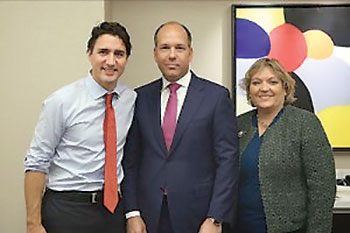 Liberal Party leader Justin Trudeau (left) with Ukrainian Canadian Congress President Paul Grod and UCC First Vice-President Renata Roman.
