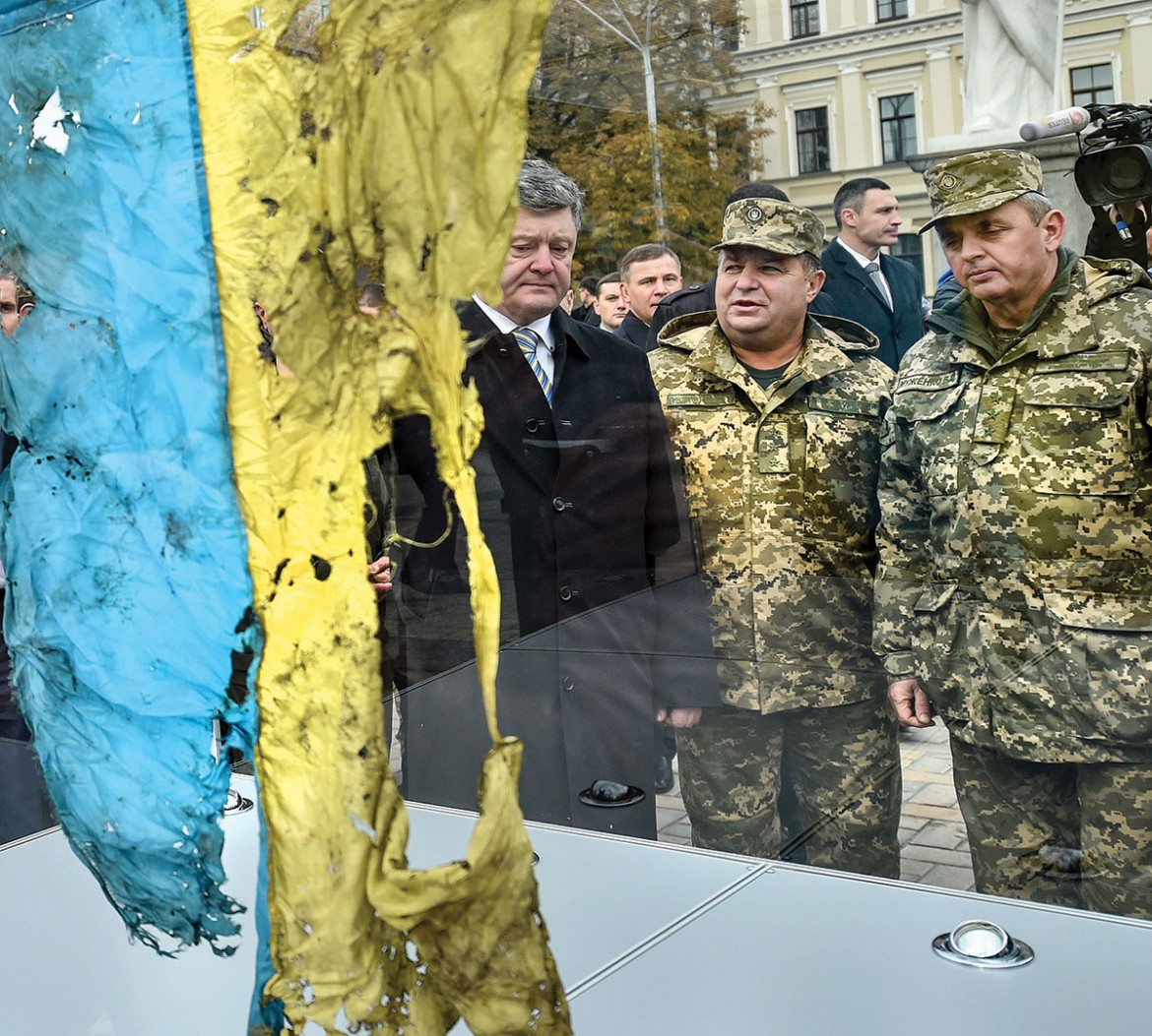 A flag from the battle of Ilovaisk that was on display as part of the exhibit “Power of the Unbroken” on Kyiv’s St. Michael’s Square.