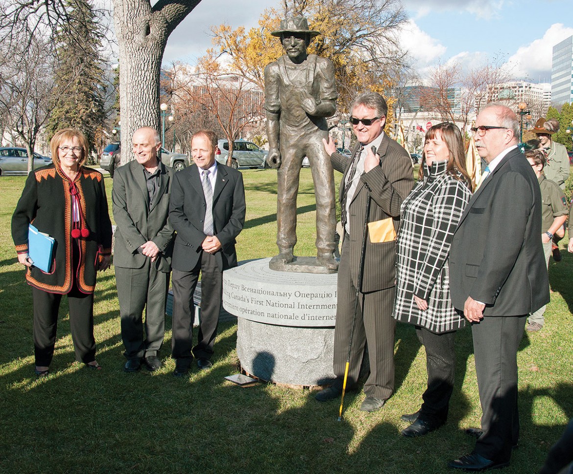 At the unveiling of the internment statue (from left) are: Oksana Bondarchuk, Manitoba Provincial Minister Dave Chomiak, Member of Parliament Kevin Lamoureux, Winnipeg Councilor Ross Eadie, Andrea Malysh and Emil Yereniuk.