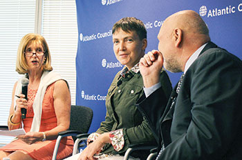 Paula J. Dobriansky (left), an Atlantic Council board director, introduces Nadiya Savchenko (center) at an Atlantic Council event in Washington on September 22. On the right is Ms. Savchenko’s interpreter, Alexei Sobchenko.