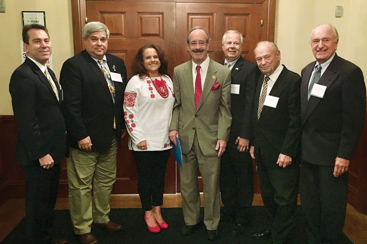 Rep. Eliot Engel (fourth from left) with members of the board of the SUMA Federal Credit Union.