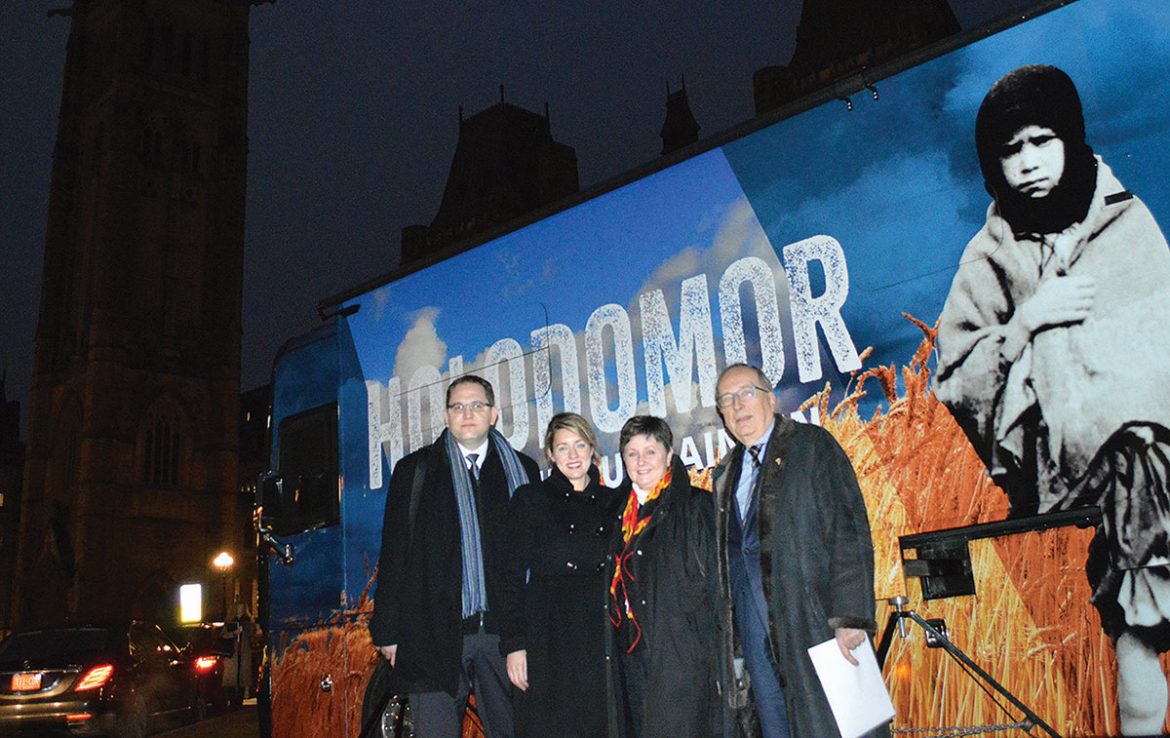 Minister of Canadian Heritage Melanie Joly visits the mobile classroom of the Holodomor National Awareness Tour.