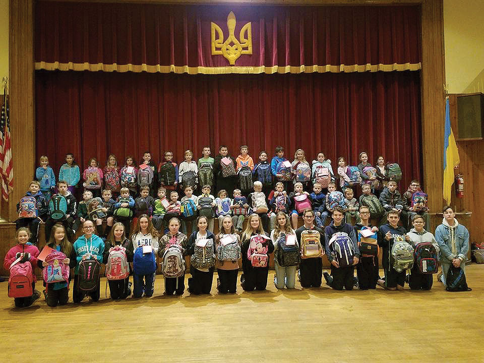 Children of the Ukrainian American Youth Association branch in Passaic, N.J., with their gifts for children in Ukraine.