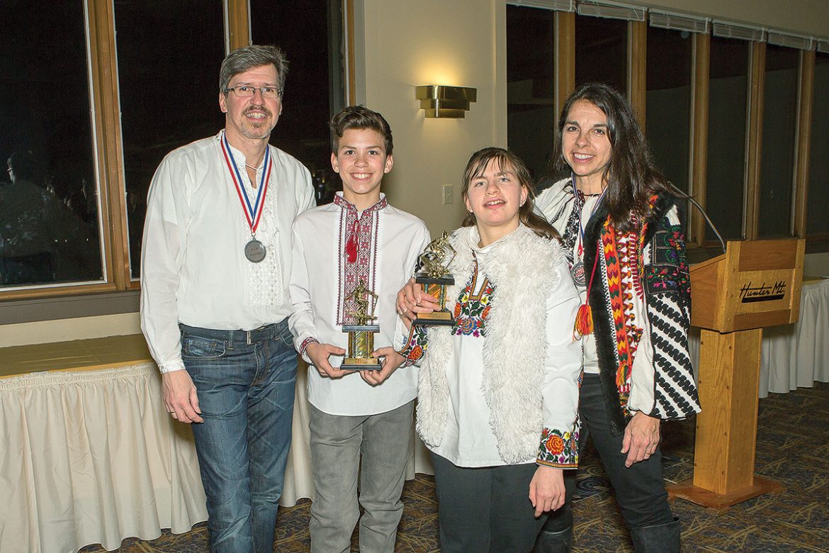 All the members of the Wojcickyj family, (from left) Stefan, Marko, Adriana and Natalia, competed in the races. Marko received the trophy for boys age 12-14; Adriana received a special award for bi-skiing.