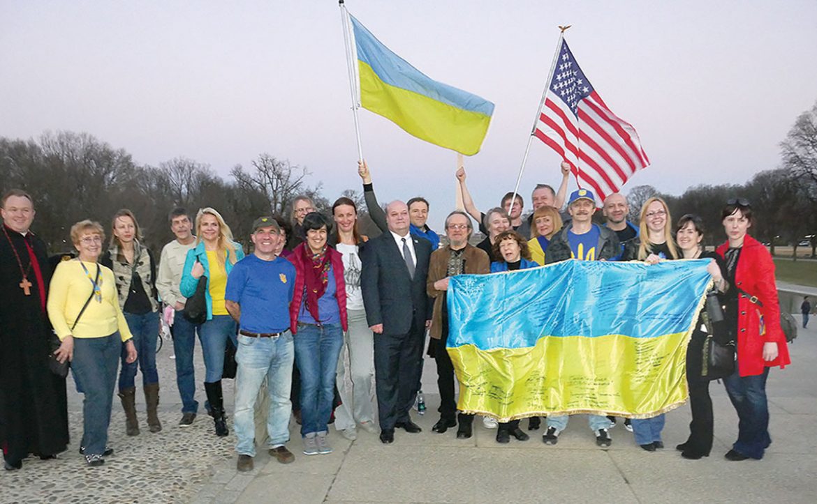 United Help Ukraine members and community organizers gather following a political rally on the National Mall in Washington in February.