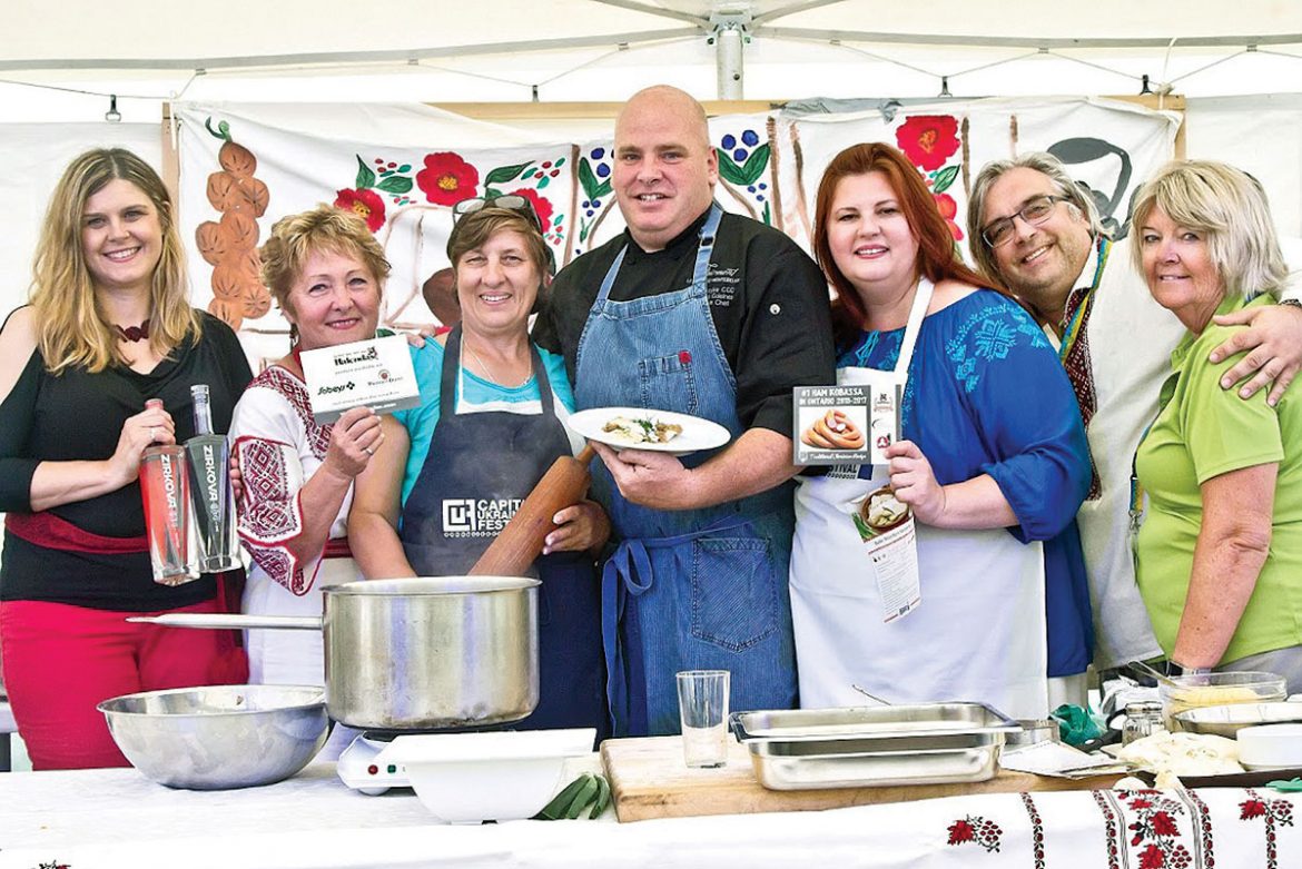 At Chef Tim’s cooking demonstration (from left) are: Katherine Vellinga of Multiculture Bevco, Maria Lachowich of the Ukrainian Catholic Women’s League of Canada, Mama Raisa, Chef Tim Wasylko of Fairmont Le Chateau Montebello, Jane Kolbe of Capital Ukrainian Festival, and Yuriy Diakunchak and Alison Conroy of the Ukrainian Credit Union.
