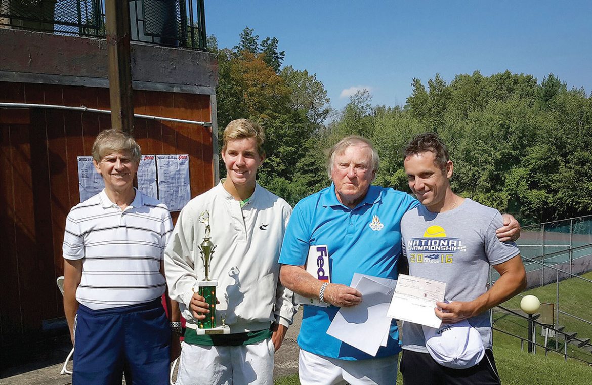 Adrian Charchalis (second from left), men’s co-champion, with (from left) Ivan Durbak, Yurko Sawchak and Ben Sulsky, men’s semi-finalist.
