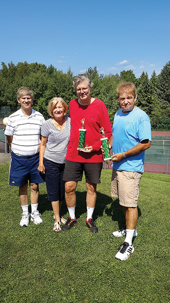 Trophy winners George Walchuk (second from right) and Steve Sosiak (right) with Ivan Durbak and Petrusia Sawchak.
