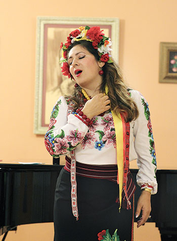 Olga Lisovska performs at Christ the King Parish Center.