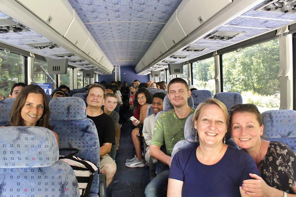 Students and faculty head upstate by bus.