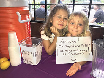 Kalyna Konrad and Zoryana Popadynec proudly wrap-up their lemonade stand at Soyuzivka with a thank-you to their patrons and a report on the fund-raiser’s results.