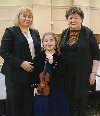At the festival (from left) are: Oksana Pidruchna, violin award recipient Julia Perekhozhuk and Mary Pidkowich.
