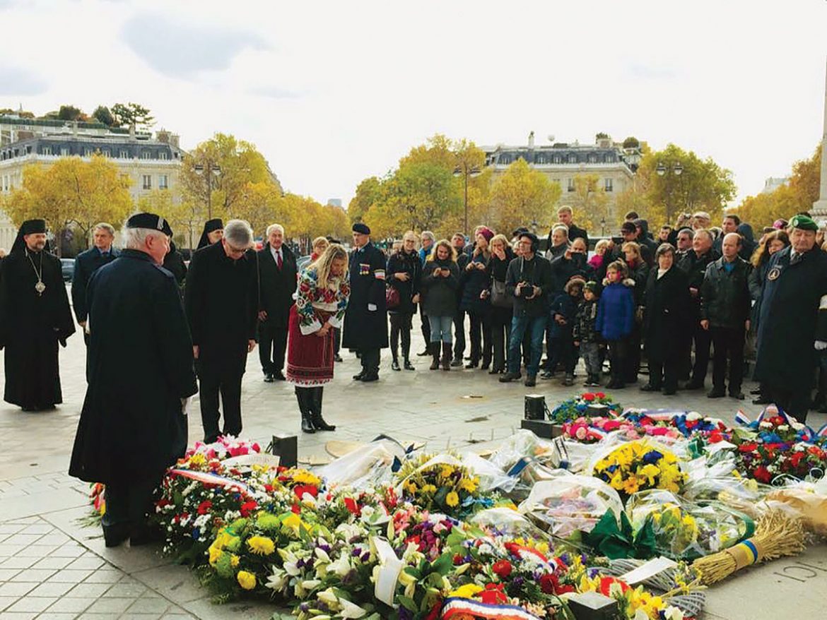 The wreath-laying ceremony for the victims of the Holodomor at the Tomb of the Unknown Soldier and Eternal Flame at the Arc de Triomphe in Paris.